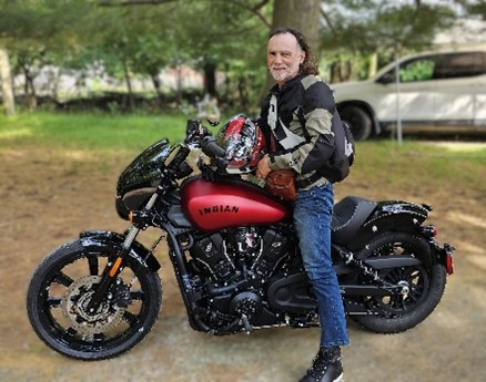 Mark with his Indian Scout motorcycle